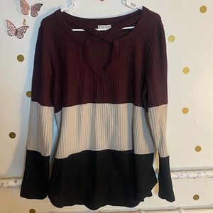 Long sleeve, maroon black and tan, cross cross front
